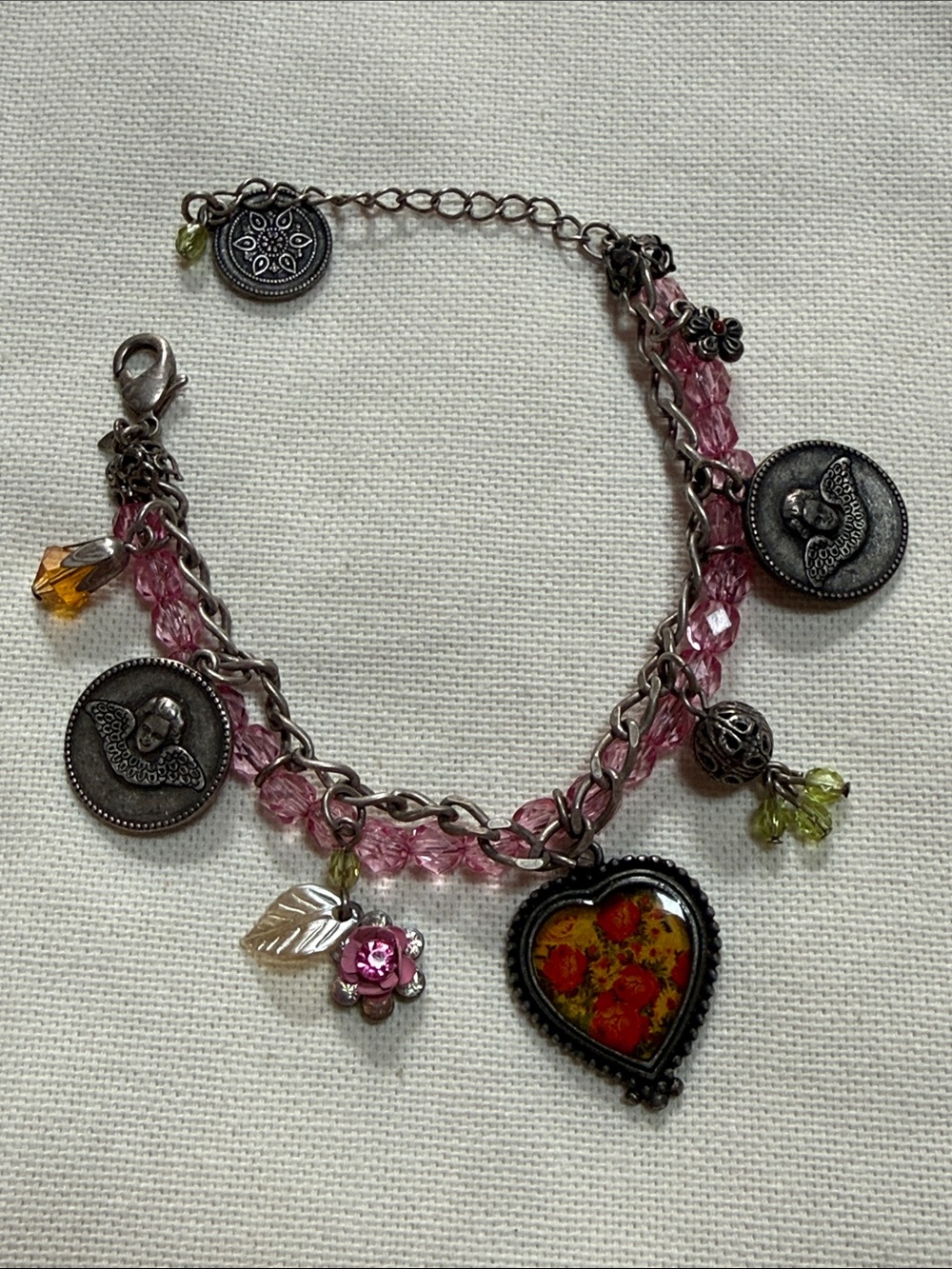 Avon Silver Chain Pink Beaded Hearts Flowers and Angels Charm Bracelet